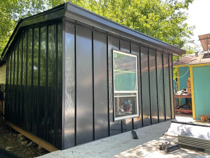 Black standing seam metal wall panels for Roof Inspection in Cayce